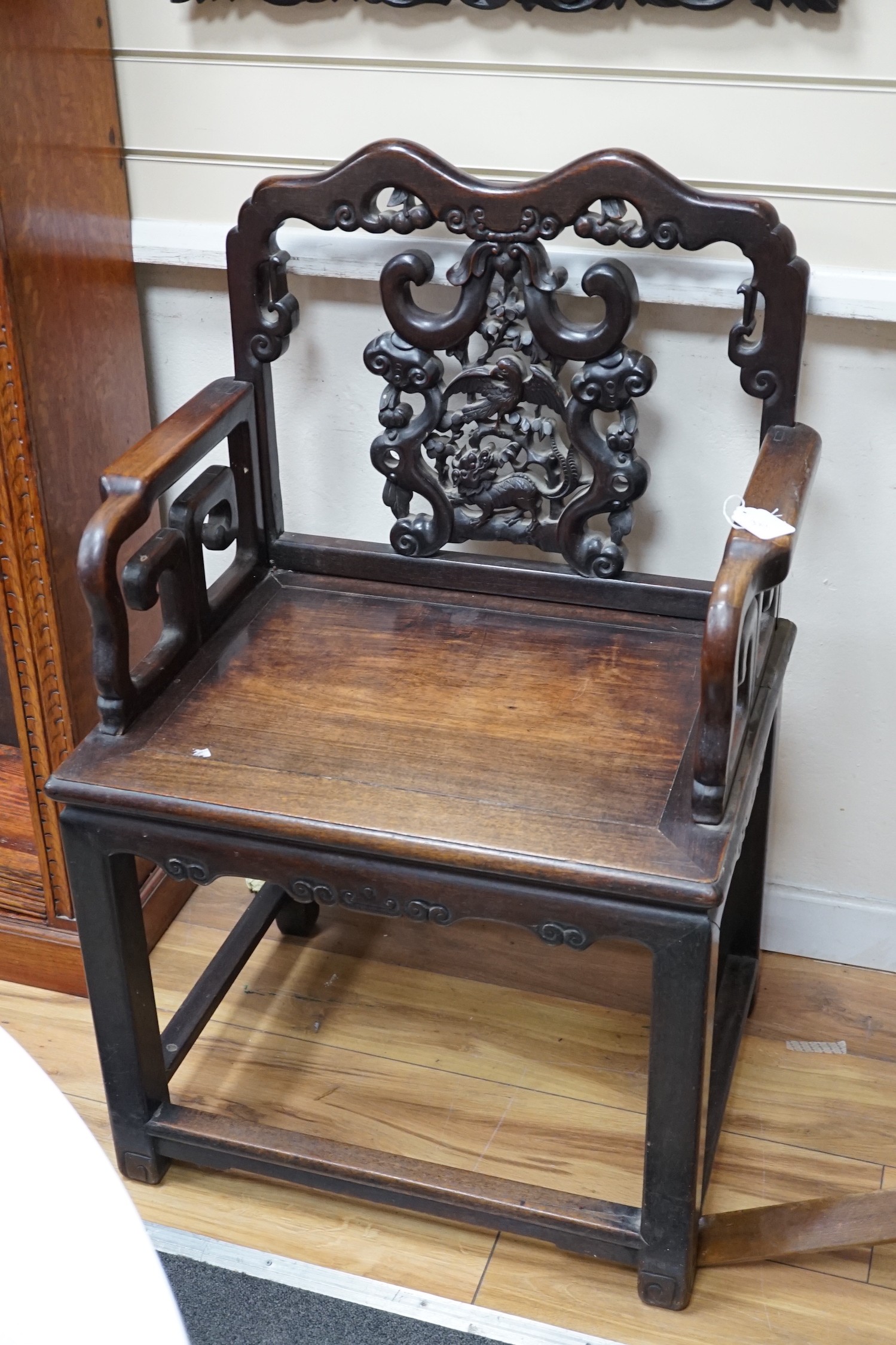 A 19th century Chinese hongmu armchair, width 64cm *Please note the sale commences at 9am.